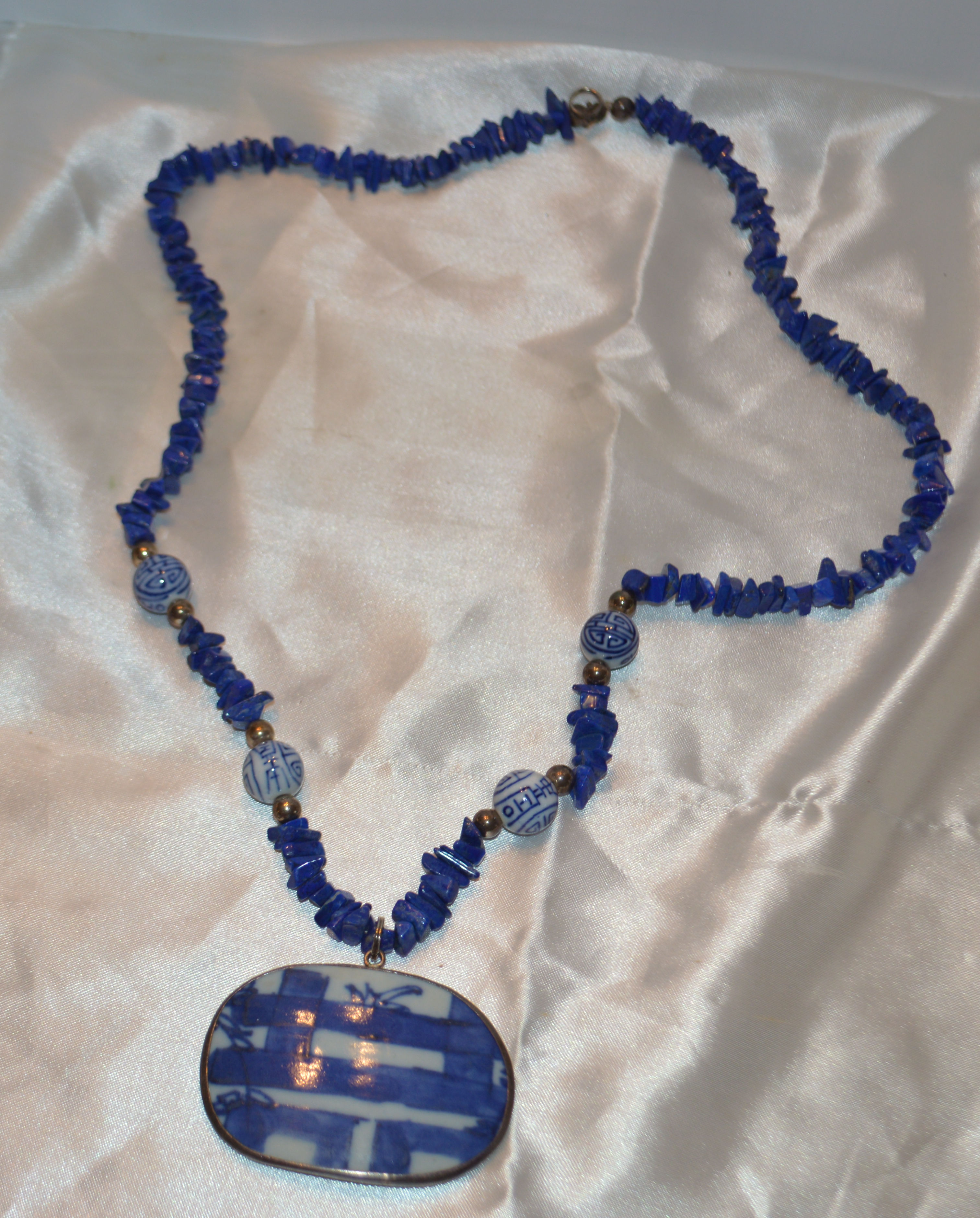 Beautiful blue and silver colored beads necklace
